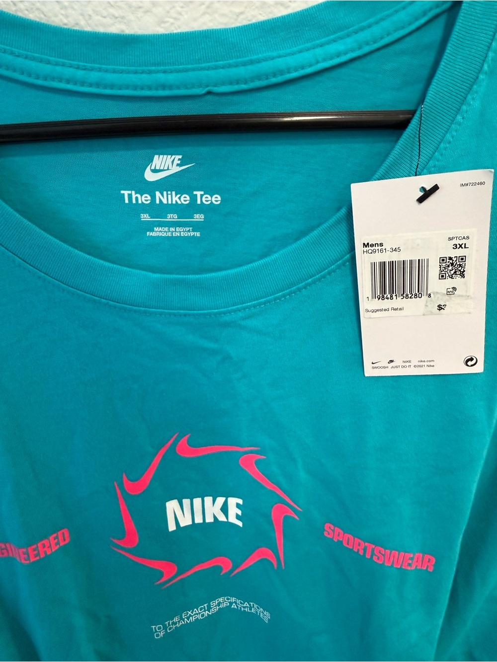 Nike Men’s Teal T-Shirt with Pink Graphic